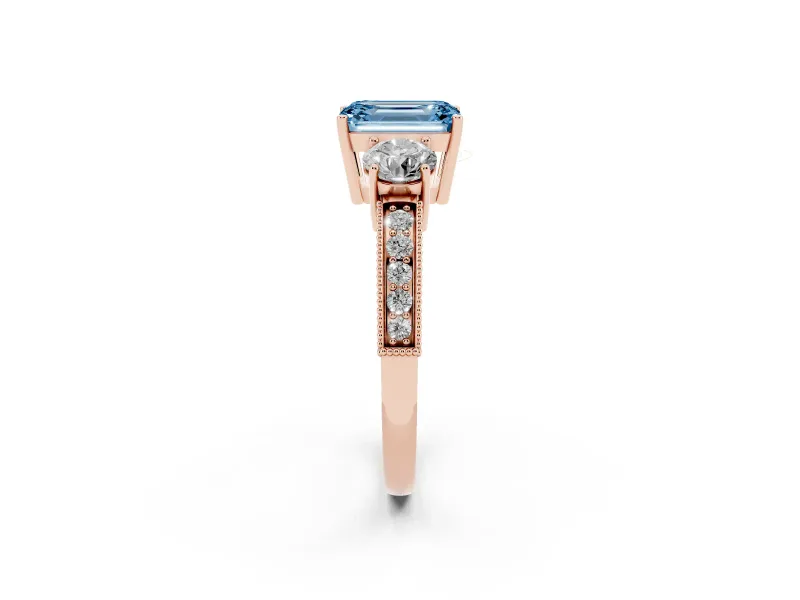 Fancy Blue Emerald Cut Diamond Three-Stone Ring Set in Rose gold with Round Side Stones and Pavé Band
