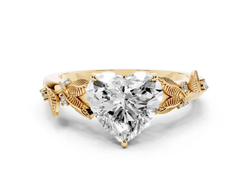 Heart Cut Diamond Solitaire Ring Set in Yellow gold with Leaf Motif Band