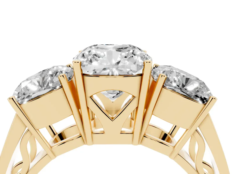 Cushion Cut Diamond Three-Stone Ring Set in Yellow gold with Textured Band