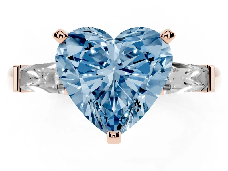 Fancy Blue Heart Cut Diamond Solitaire Ring Set in Rose gold with Tapered Baguette Side Stones and Prong Setting