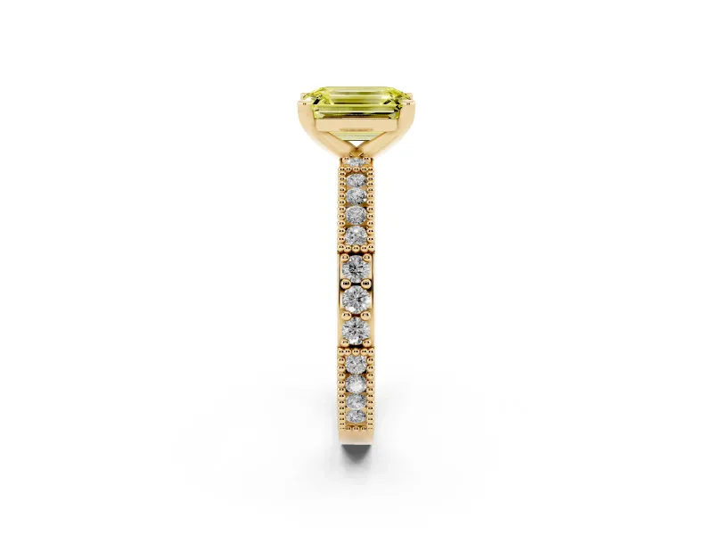Fancy Yellow Emerald Cut Diamond Solitaire Ring Set in Yellow gold with Slim Pavé Band and Prong Setting
