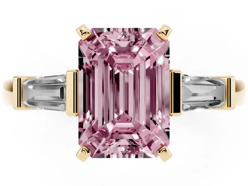 Fancy Pink Emerald Cut Diamond Solitaire Ring Set in Yellow gold with Tapered Baguette Accents and Prong Setting