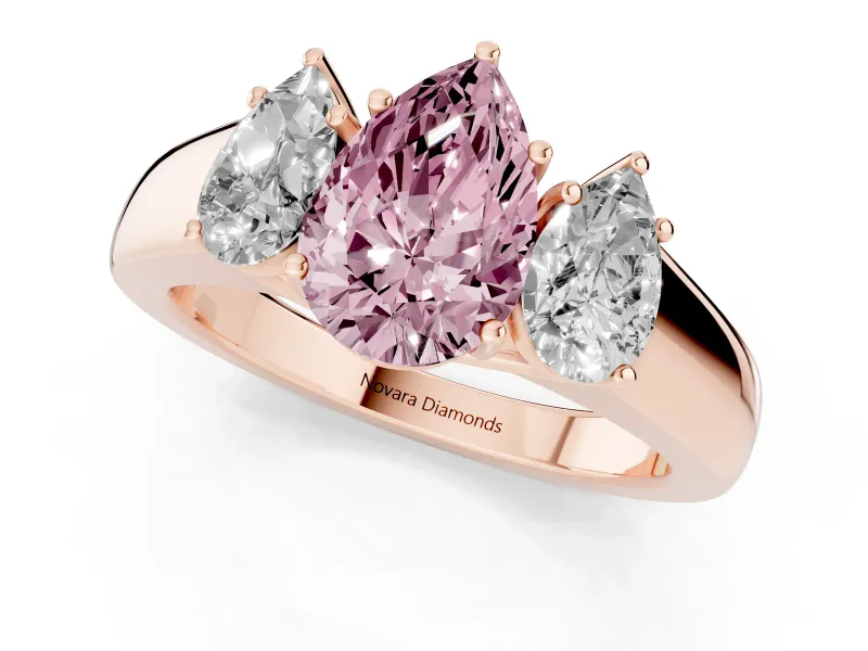 Fancy Pink Three-Stone Pear Cut Diamond Ring Set in Rose gold with Matching Prong Settings and Plain Band