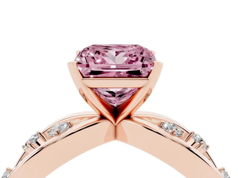 Fancy Pink Princess Cut Diamond Solitaire Ring Set in Rose gold with Side Stones on Criss-Cross Band and Prong Setting