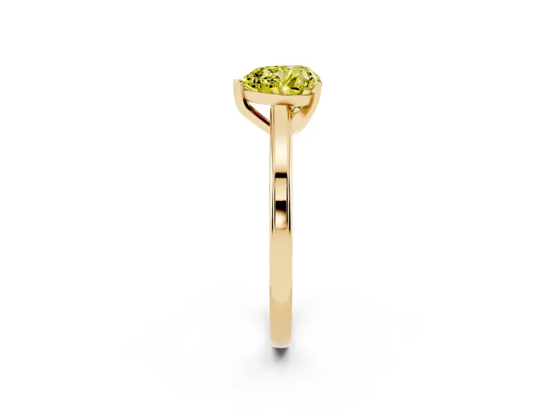 Fancy Yellow Heart Cut Diamond Solitaire Ring Set in Yellow gold with Prong Setting and Classic Band