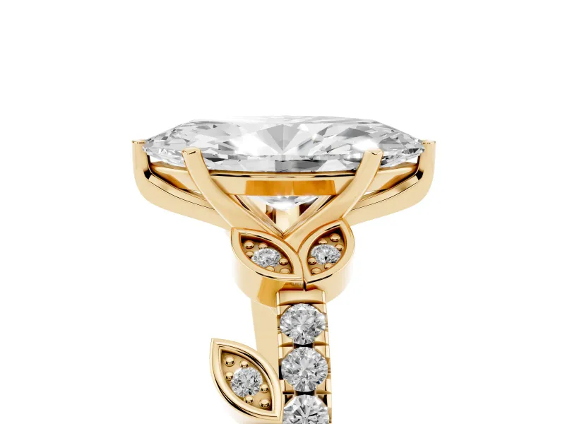 Marquise Cut Diamond Solitaire Leaf-Inspired Ring Set in Yellow gold with Pavé Band and Prong Setting