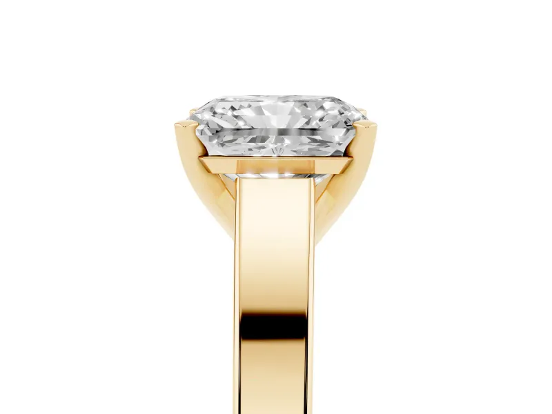 Radiant Cut Diamond Solitaire Engagement Ring Set in Yellow gold with Prong Setting and Tapered Band