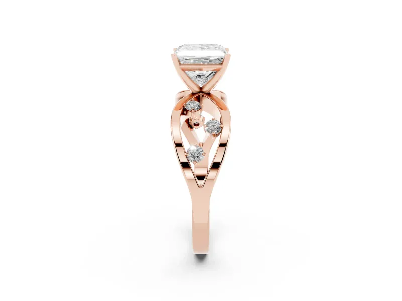Princess Cut Diamond Solitaire Ring Set in Rose gold with Side Stones on Criss-Cross Band and Prong Setting