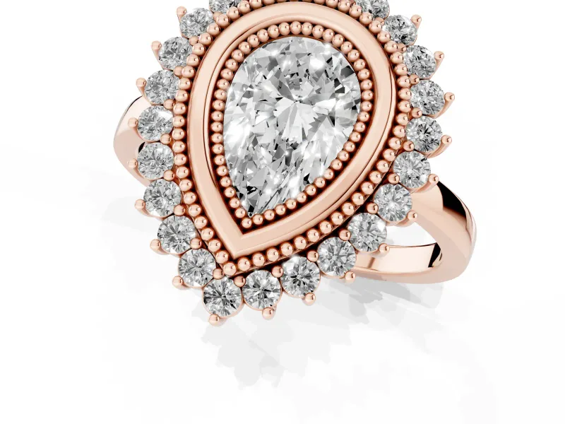 Pear Cut Diamond Halo Ring Set in Rose gold with Milgrain Edge and Round Prong Setting