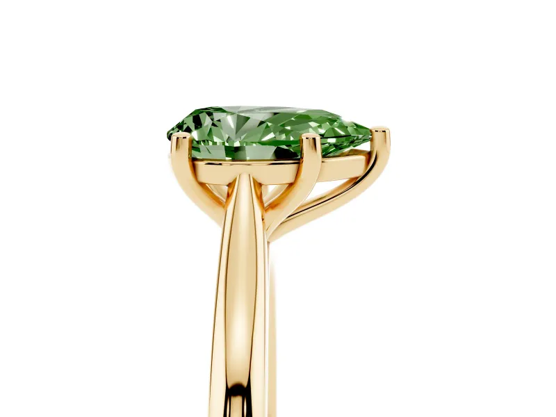 Fancy Green Pear Cut Diamond Solitaire Ring Set in Yellow gold with Cathedral Band and Prong Setting