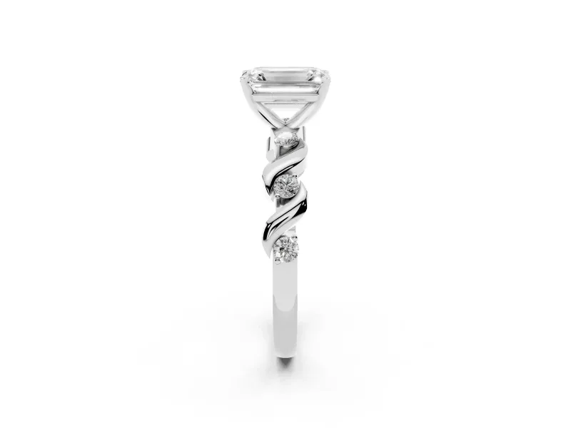 Emerald Cut Diamond Solitaire Ring Set in White gold with Ribbon Twist Band, Round Accents and Prong Setting