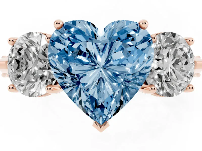 Fancy Blue Heart Cut Diamond Three-Stone Ring Set in Rose gold with Milgrain Band