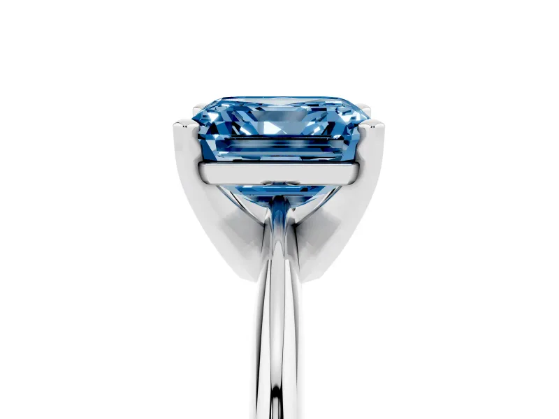 Fancy Blue Asscher Cut Diamond Solitaire Ring Set in Platinum with Prong Setting on a Plain Round Band
