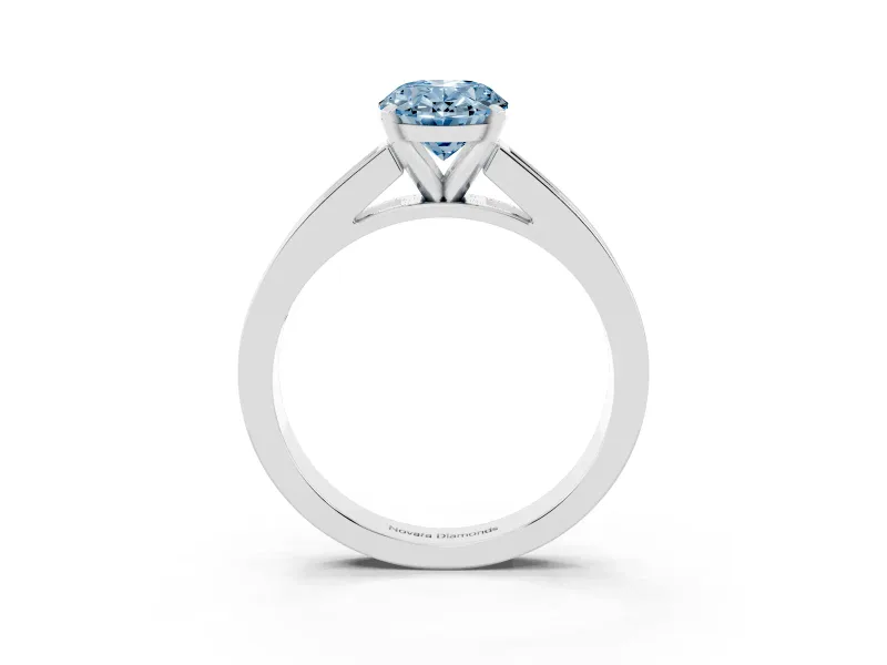 Fancy Blue Oval Cut Diamond Solitaire Ring Set in White gold with Channel-Set Band and Prong Setting