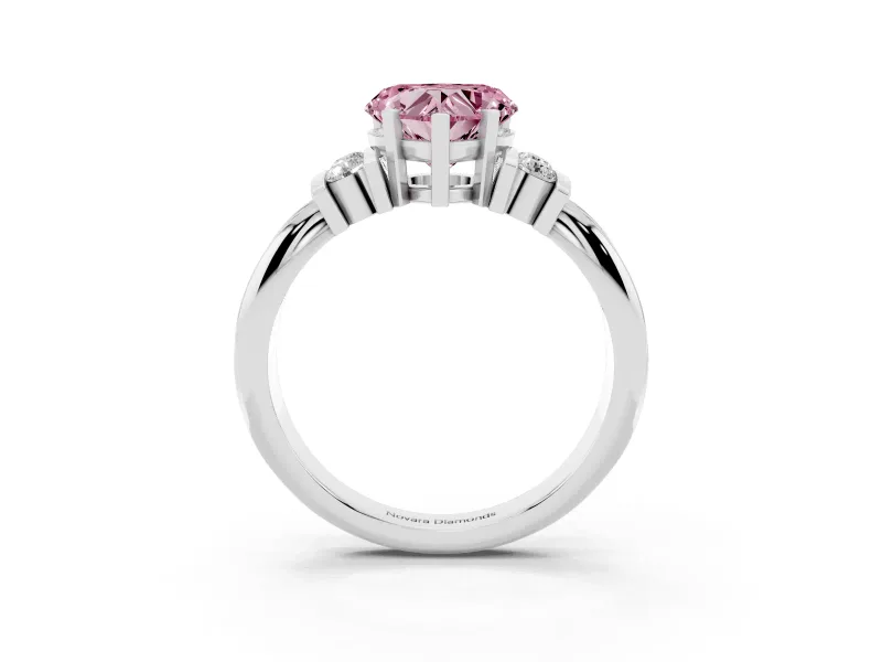 Fancy Pink Three-Stone Heart Cut Diamond Channel Set Ring Set in White gold with Bar Prongs