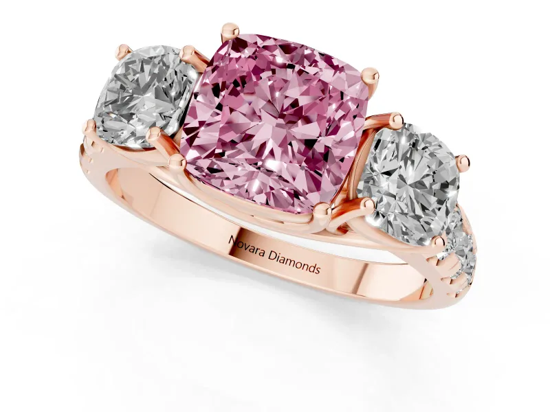 Fancy Pink Cushion Cut Diamond Three-Stone Ring Set in Rose gold with Pavé Band