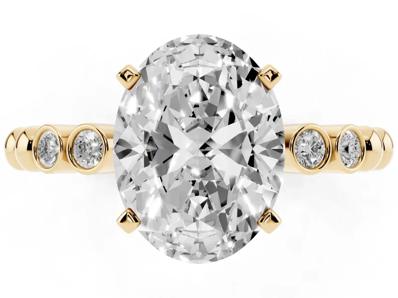 Oval Cut Diamond Solitaire Engagement Ring Set in Yellow gold with Bezel Accents on Beaded Band