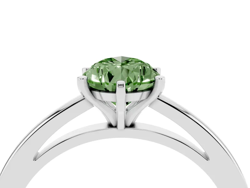 Fancy Green Pear Cut Diamond Solitaire Engagement Ring Set in White gold with Prong Setting on a Classic Band