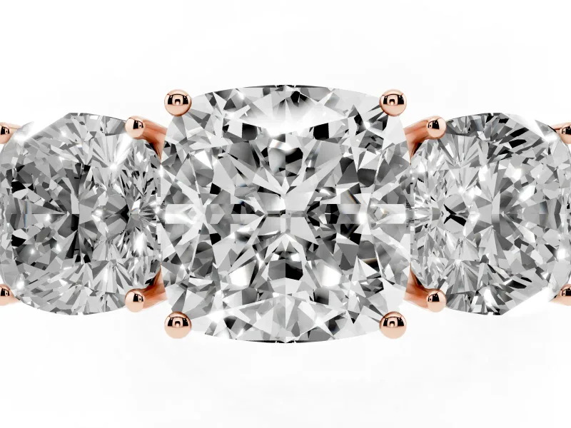 Cushion Cut Diamond Three-Stone Ring Set in Rose gold with Textured Band