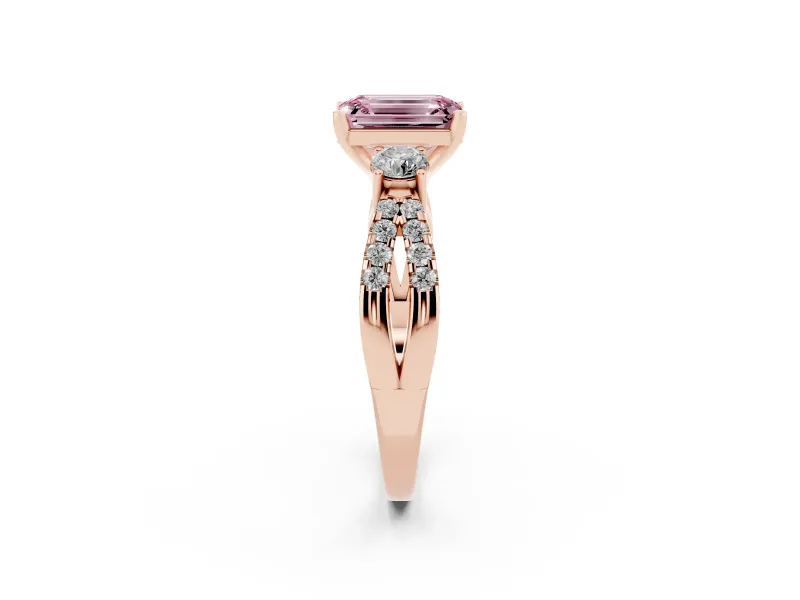 Fancy Pink Emerald Cut Diamond Three-Stone Ring Set in Rose gold with Pavé Split Shank and Prong Setting