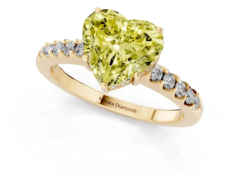 Fancy Yellow Heart Cut Diamond Solitaire Engagement Ring Set in Yellow gold with Pavé Band and Prong Setting