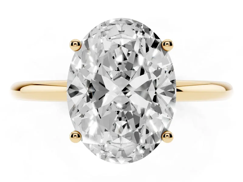 Oval Cut Diamond Solitaire Engagement Ring Set in Yellow gold with Thin Band and Prong Setting