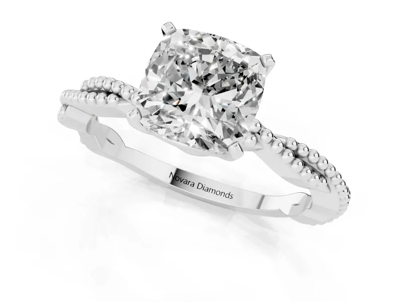 Cushion Cut Diamond Solitaire Ring Set in Platinum with Twisted Band and Bead Prong Setting