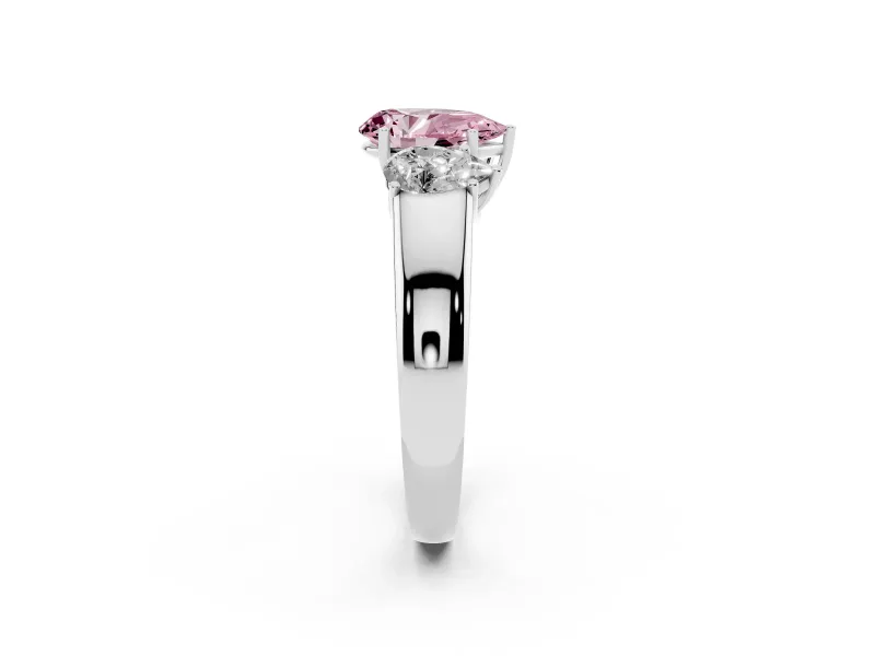 Fancy Pink Three-Stone Pear Cut Diamond Ring Set in Platinum with Matching Prong Settings and Plain Band
