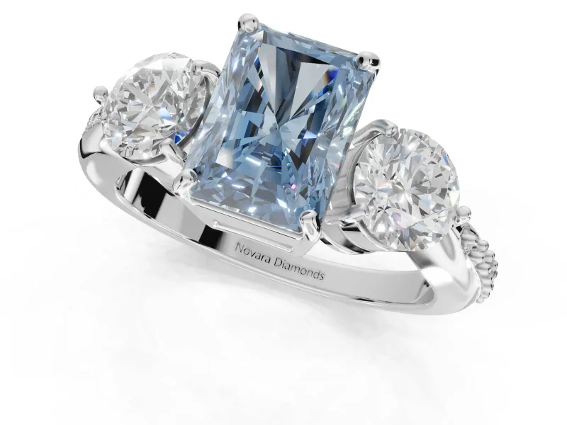 Radiant Cut Three Stone Engagement Ring Setting for a Fancy Blue Lab-Grown Diamond | Tapered Pave Band | Sterling Silver