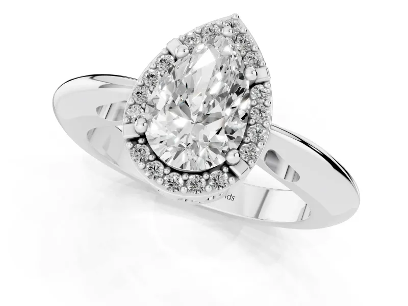 Pear Cut Diamond Halo Engagement Ring Set in Platinum with Plain Split Shank and Prong Setting