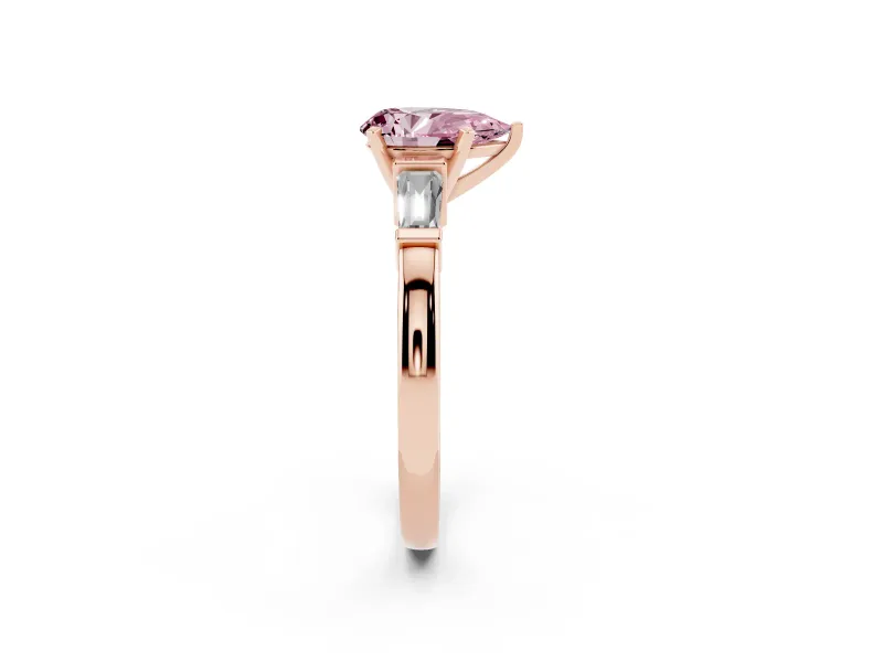 Fancy Pink Pear Cut Diamond Solitaire Ring Set in Rose gold with Tapered Baguette Accents and Prong Setting