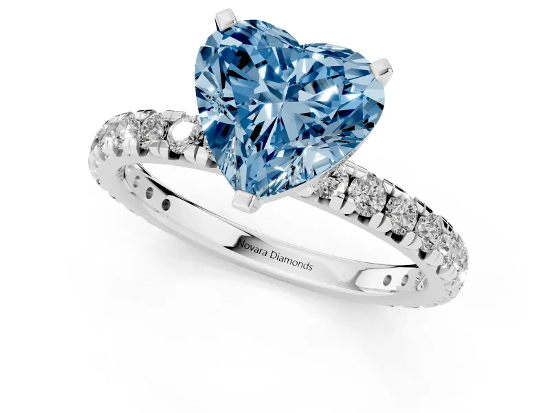 Fancy Blue Heart Cut Diamond Pavé Solitaire Ring Set in Silver with Round Band and Prong Setting