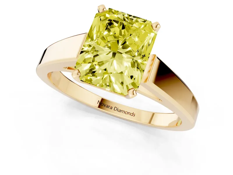 Fancy Yellow Radiant Cut Diamond Solitaire Engagement Ring Set in Yellow gold with Prong Setting and Tapered Band