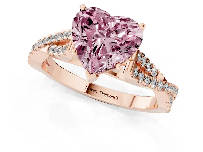 Fancy Pink Heart Cut Diamond Solitaire Engagement Ring Set in Rose gold with Twisted Pavé Band and Prong Setting