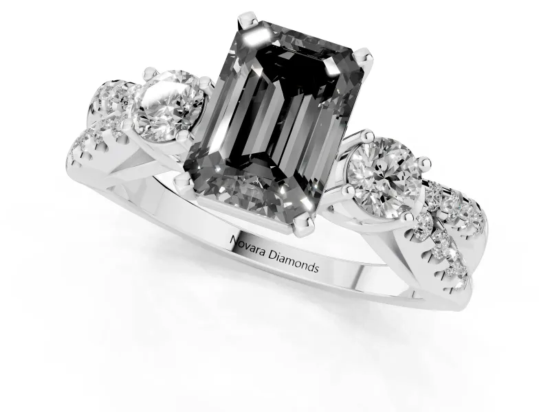 Fancy Black Emerald Cut Diamond Three-Stone Ring Set in White gold with Pavé Split Shank and Prong Setting