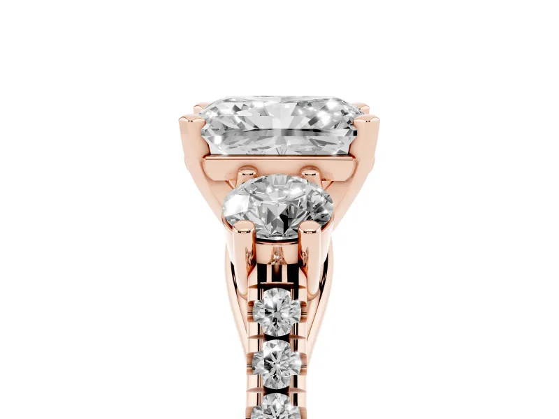 Three-Stone Radiant Cut Diamond Pavé Band Ring Set in Rose gold with Prong-Set Trio