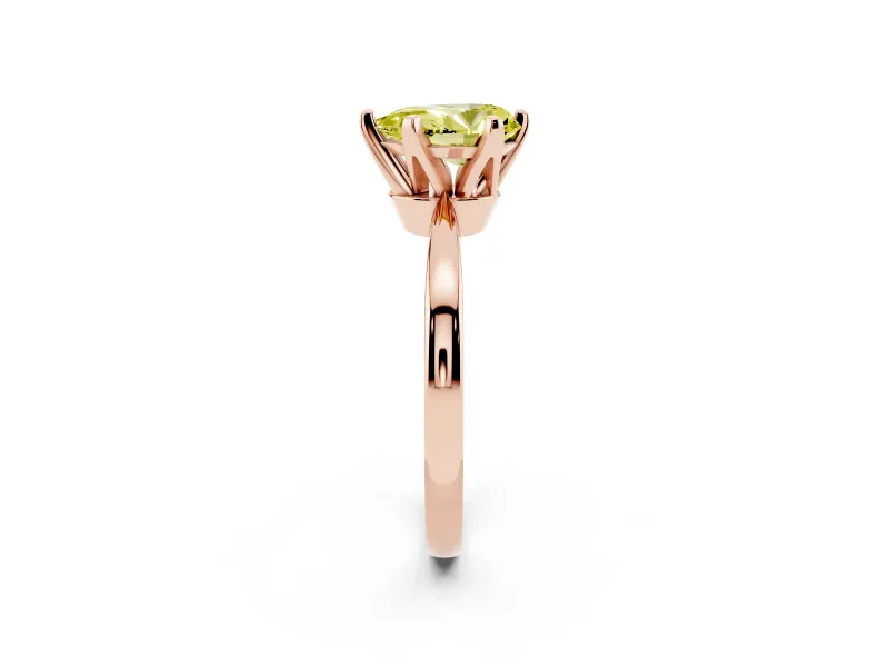 Fancy Yellow Pear Cut Diamond Solitaire Engagement Ring Set in Rose gold with Slim Tapered Solitaire Band