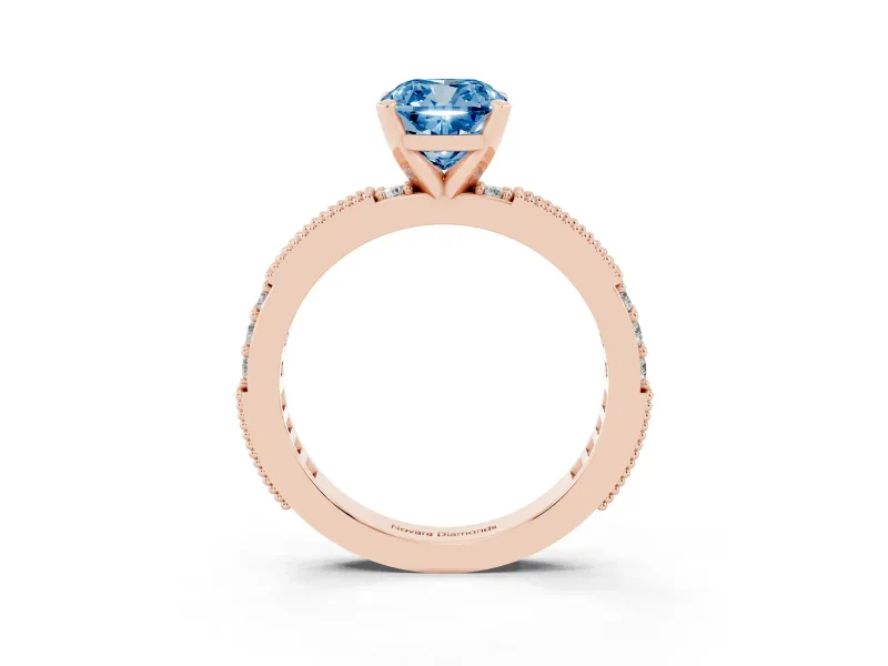 Fancy Blue Cushion Cut Diamond Solitaire Ring Set in Rose gold with Slim Pavé Band and Prong Setting