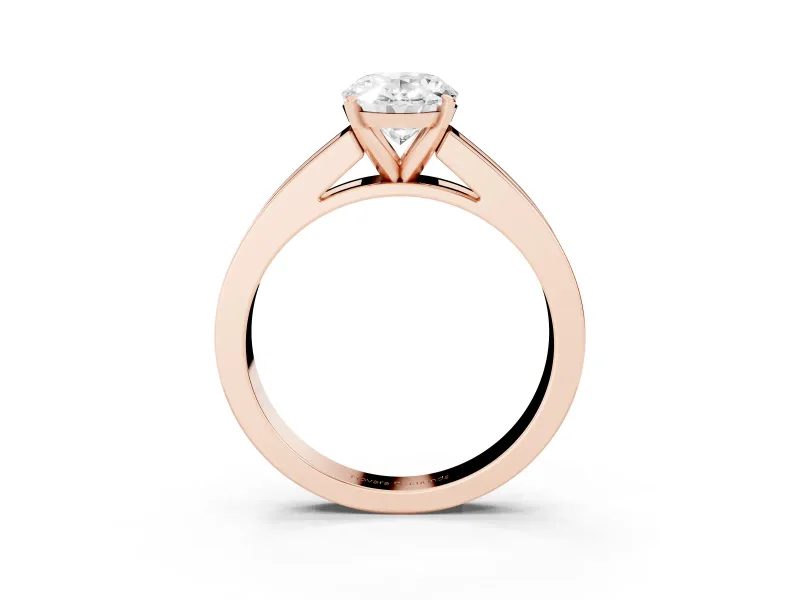 Oval Cut Diamond Solitaire Ring Set in Rose gold with Channel-Set Band and Prong Setting