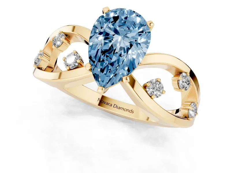 Fancy Blue Pear Cut Diamond Solitaire Ring Set in Yellow gold with Side Stones on Criss-Cross Band and Prong Setting