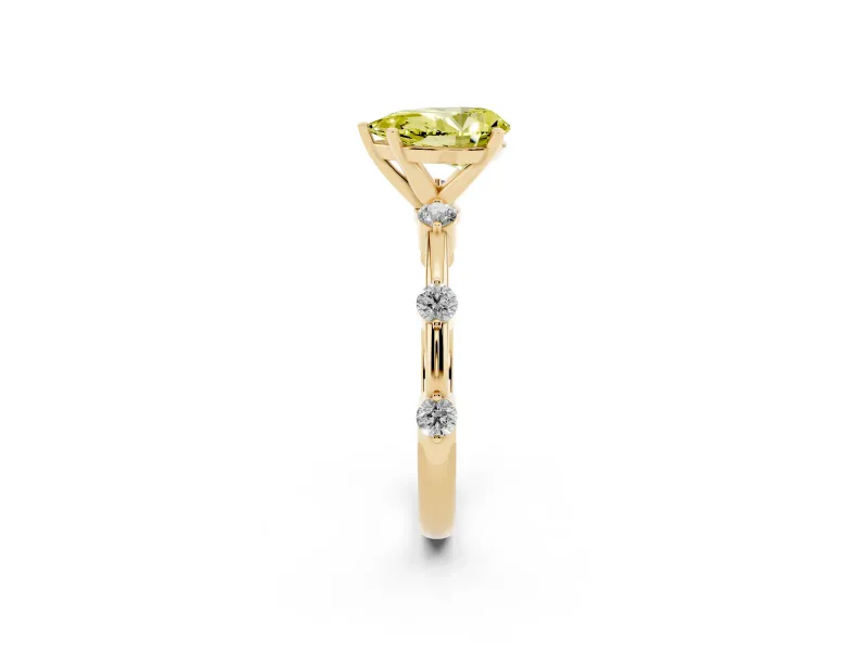 Fancy Yellow Pear Cut Diamond Solitaire Ring Set in Yellow gold with Bezel Set Side Stones and Prong Setting