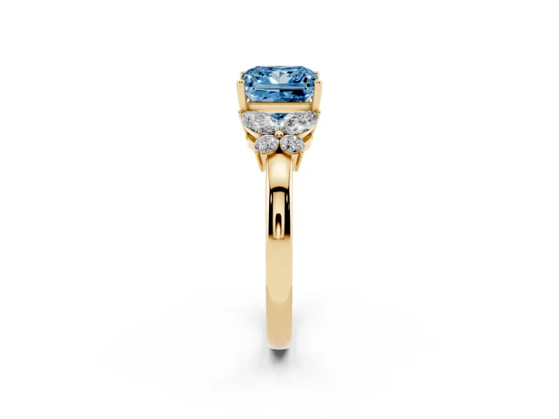 Fancy Blue Princess Cut Diamond Solitaire Floral Ring Set in Yellow gold with Marquise Petals and Prong Setting