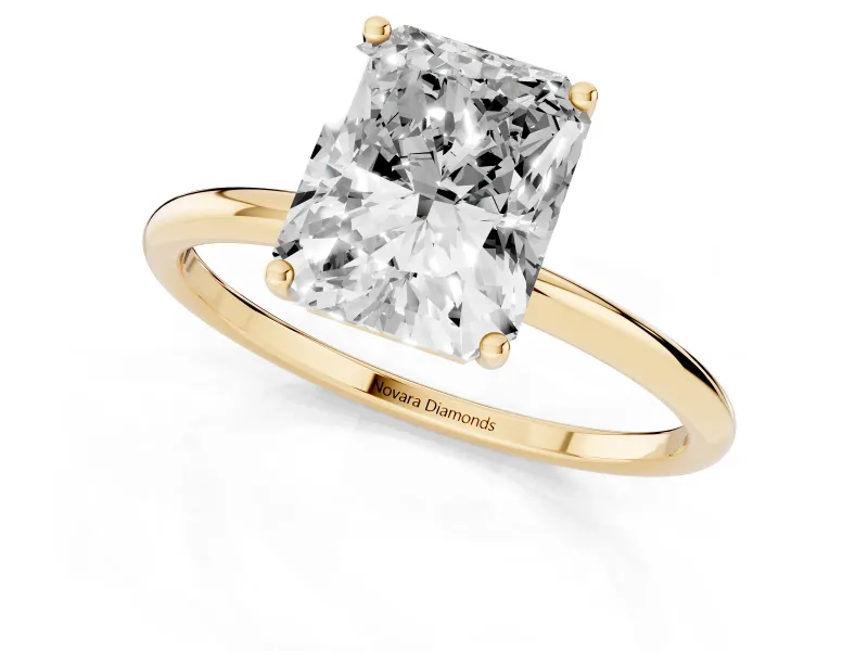 Radiant Cut Diamond Solitaire Engagement Ring Set in Yellow gold with Thin Band and Prong Setting
