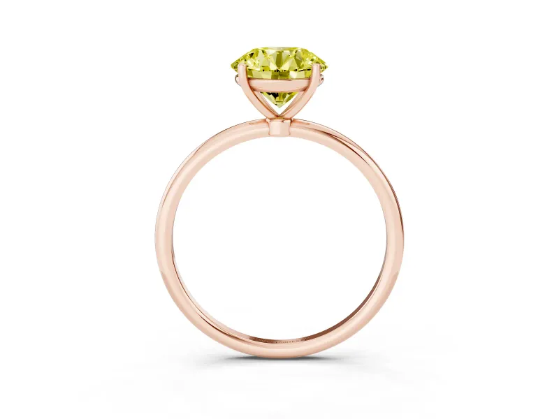 Fancy Yellow Round Cut Diamond Solitaire Engagement Ring Set in Rose gold with Thin Band and Prong Setting