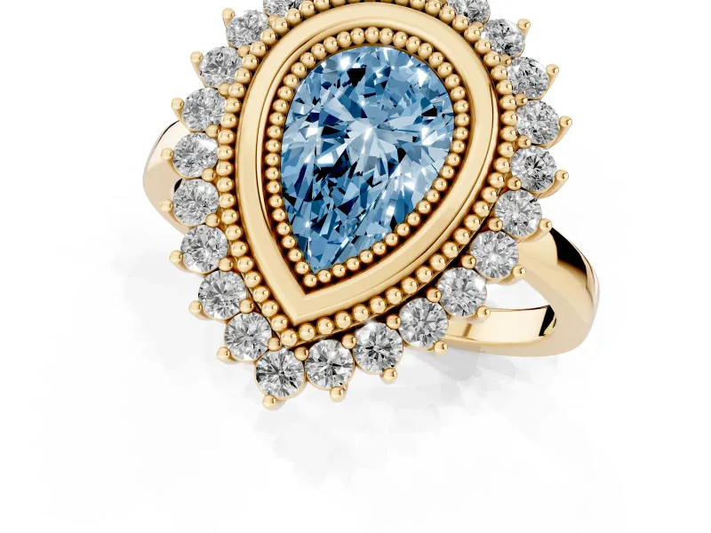 Fancy Blue Pear Cut Diamond Halo Ring Set in Yellow gold with Milgrain Edge and Round Prong Setting