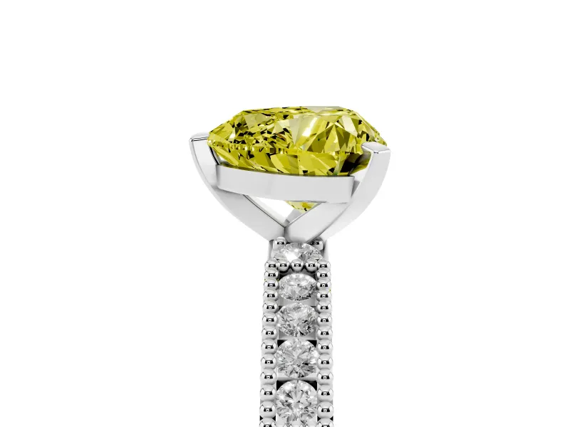 Fancy Yellow Heart Cut Diamond Solitaire Ring Set in Platinum with Slim Pavé Band and Prong Setting