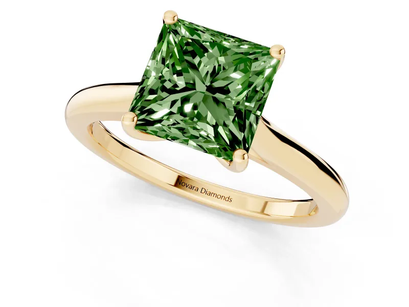 Fancy Green Princess Cut Diamond Solitaire Ring Set in Yellow gold with Cathedral Band and Prong Setting