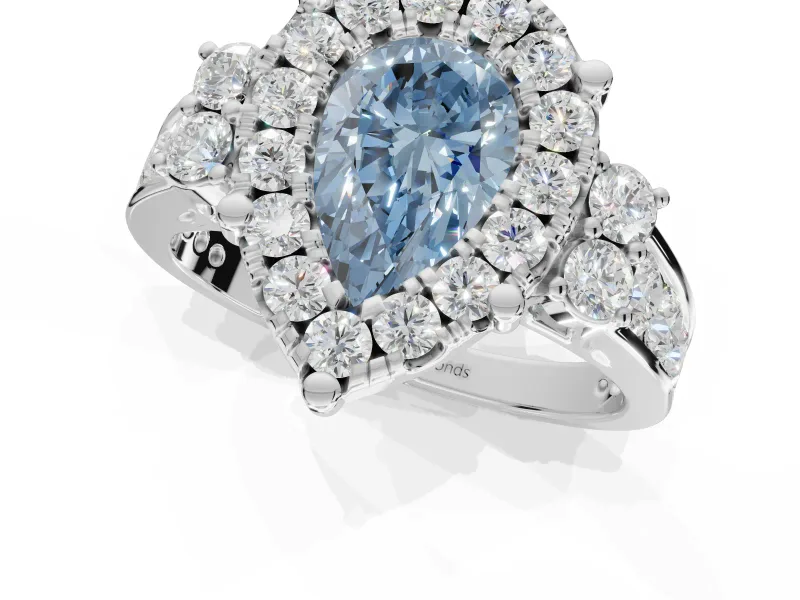 Pear-Shaped Halo Engagement Ring Setting for a Fancy Blue Lab-Grown Diamond | Graduated Channel Band | Platinum