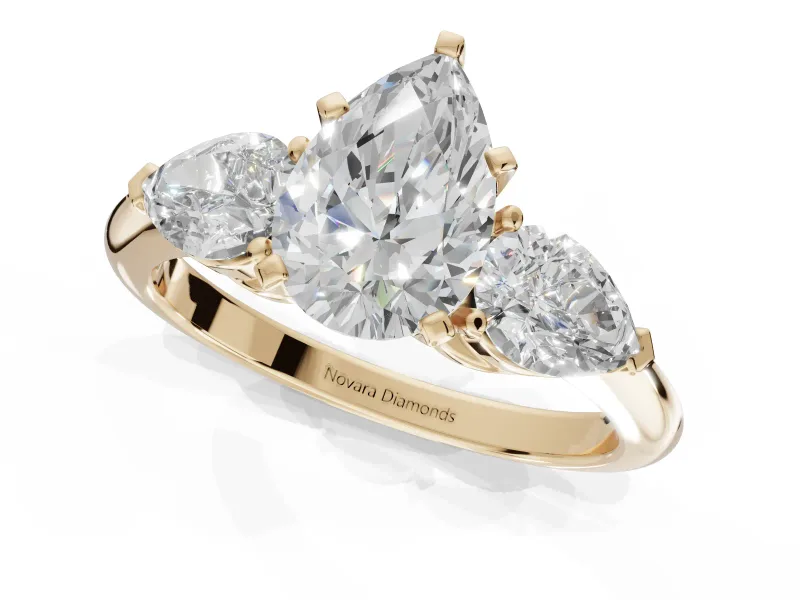 Pear-Shaped Three-Stone Engagement Ring Setting | Pear Side Stones | Yellow Gold