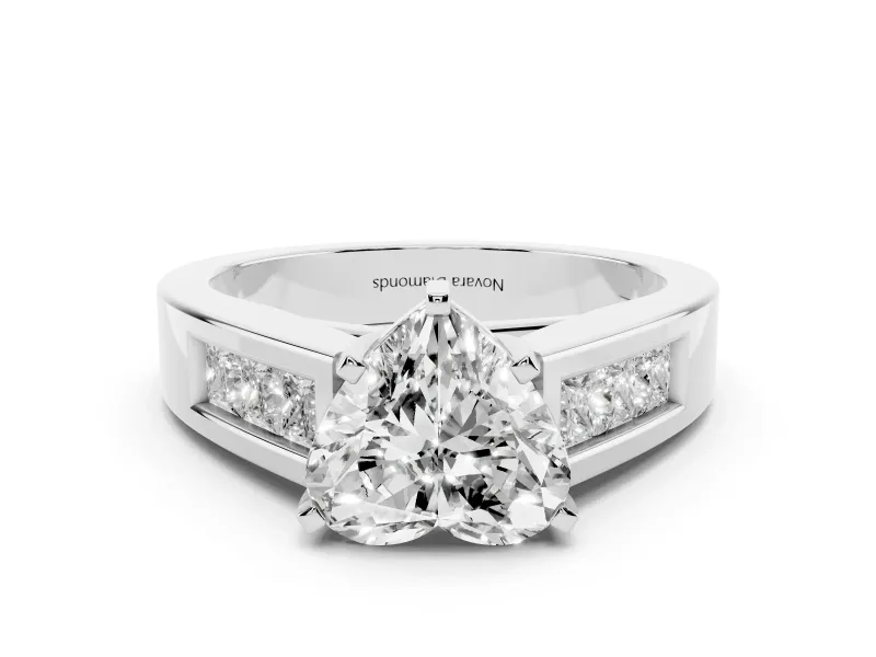 Heart Cut Diamond Solitaire Ring Set in Platinum with Channel-Set Accent Stones and Prong Setting